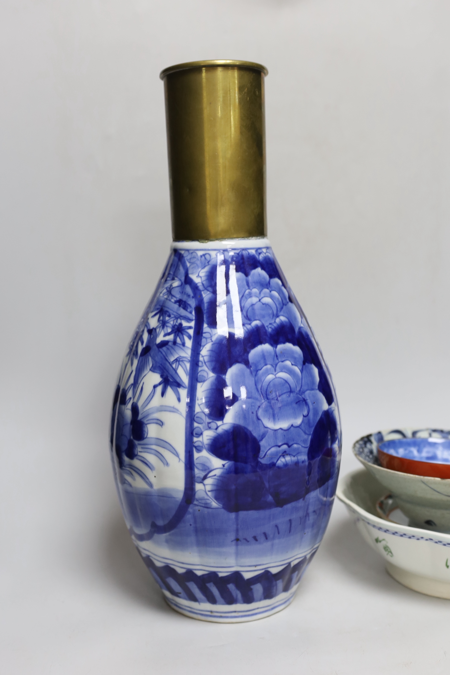 A quantity of Chinese and Japanese ceramics, tallest 43cm high